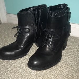 Never worn black leather ankle boots with heel.